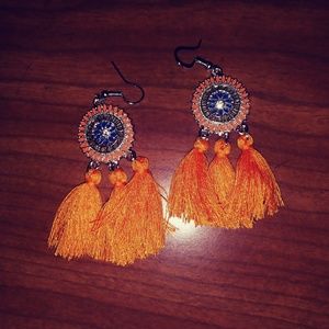 Bohemian tassel earrings. New in pkg